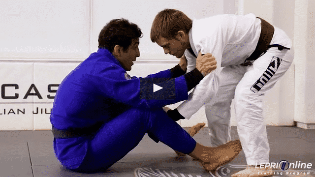 Knee Cut Pass Defense with Reverse De La Riva Hook to Back Roll Sweep