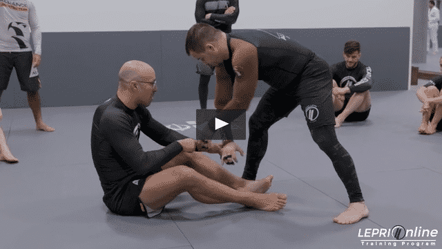 Sitting Foot Sweep by Pulling Opponent In