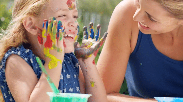 A video transition showing a cross like shape appearing into the scene, it becomes hollow and the next clip is shown as the cross shape enlargens.