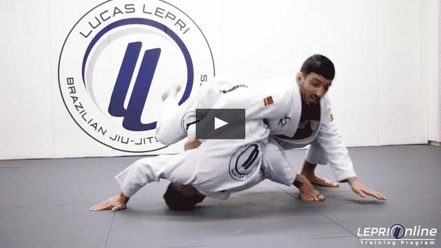 Guard Pull to Omoplata when an Opponent Defends by Rolling
