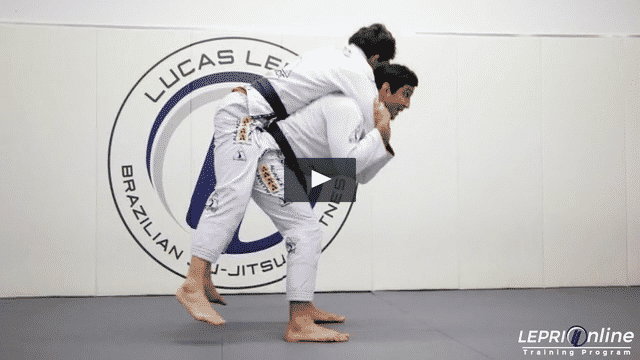 Defense Against Opponent Attacking the Neck From Behind While Standing to Knee on Belly